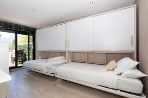 2 bedrooms, desk, iron/ironing board, travel cot