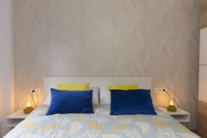 1 habitación, tabla de planchar con plancha, wifi gratis y ropa de cama 