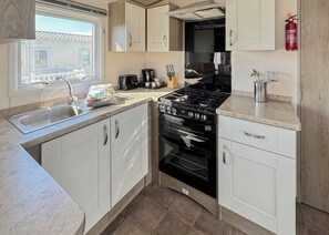 Refrigerador, horno, placa de cocina, tostadora