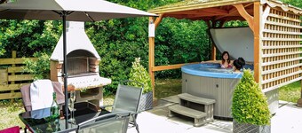 Open plan lodge with two doubles, both with TV/DVD.