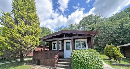 Open plan lodge with two doubles, both with TV/DVD.
