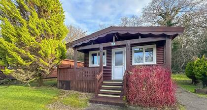 Open plan lodge with two doubles, both with TV/DVD.