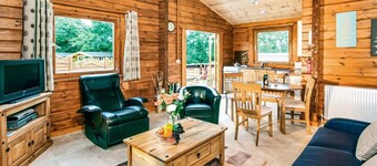 Open plan lodge with two doubles, both with TV/DVD.