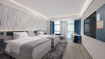 Business-Doppel- oder -Zweibettzimmer, Mehrere Betten | Wohnbereich