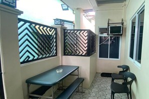 Outdoor dining - 2BR at Amplayo Apartelle — Modern comfort, cozy vibes at an affordable price... (Cagayan de Oro City)