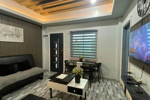 Living area - 2BR at Amplayo Apartelle — Modern comfort, cozy vibes at an affordable price... (Cagayan de Oro City)