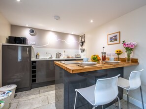 Fridge, microwave, cookware/dishes/utensils