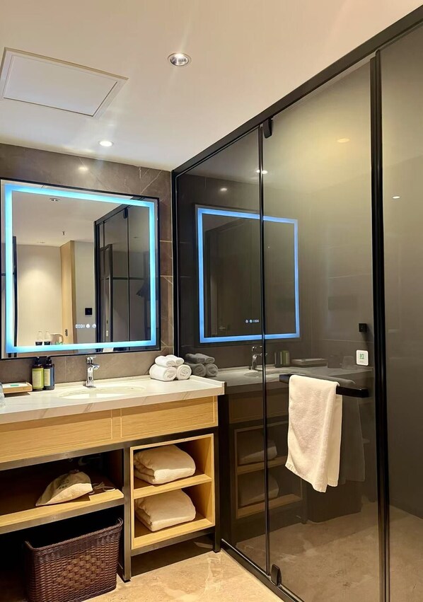 Shower, free toiletries, hair dryer, slippers