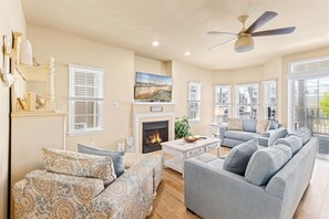 Smart TV, fireplace, books