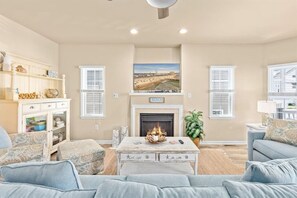 Smart TV, fireplace, books