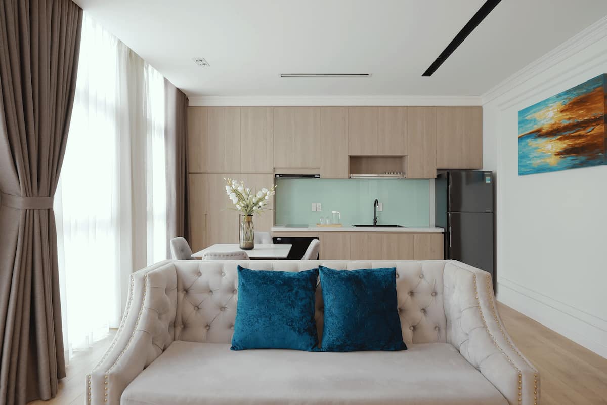 One-Bedroom Deluxe Apartment | Living area | 32-inch flat-screen TV with cable channels