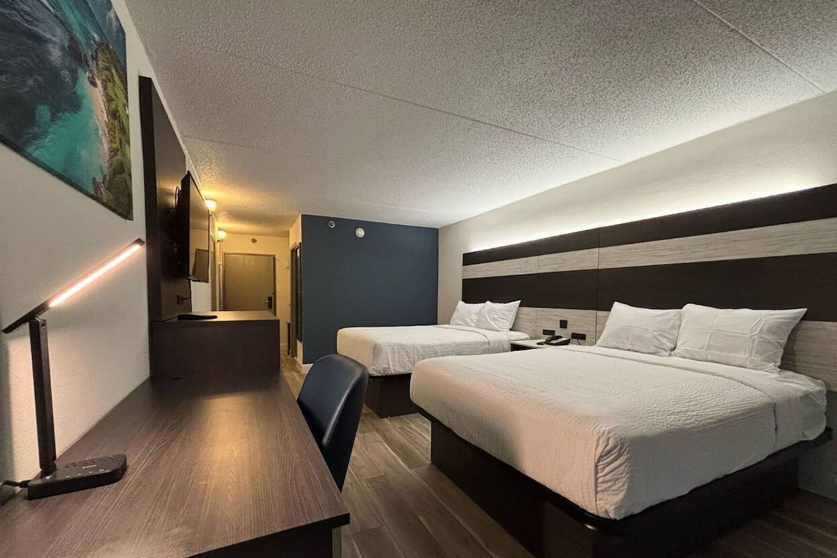 Desk, blackout drapes, WiFi (free), bed sheets