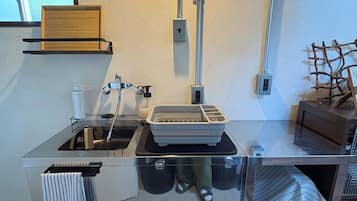 Fridge, microwave, stovetop, cookware/dishes/utensils