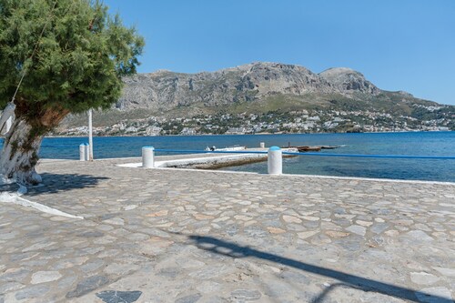 Holiday Home 'Telendos Gallery House' with Sea View, Wi-Fi and Air Conditioning