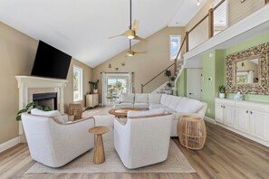Smart TV, fireplace, books, music library