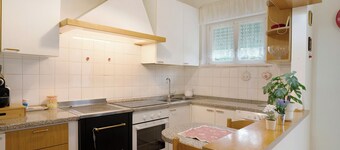 Apartamento 'Marconi 35 Pergine' con vistas a la montaña, jardín compartido y Wi-Fi