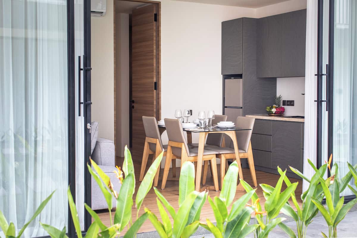 Deluxe Apartment, 1 Bedroom | Living area | 43-inch Smart TV with digital channels