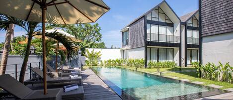 Outdoor pool, pool umbrellas, pool loungers