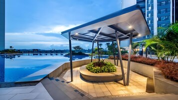 Outdoor pool, open 9:00 AM to 6:00 PM, sun loungers