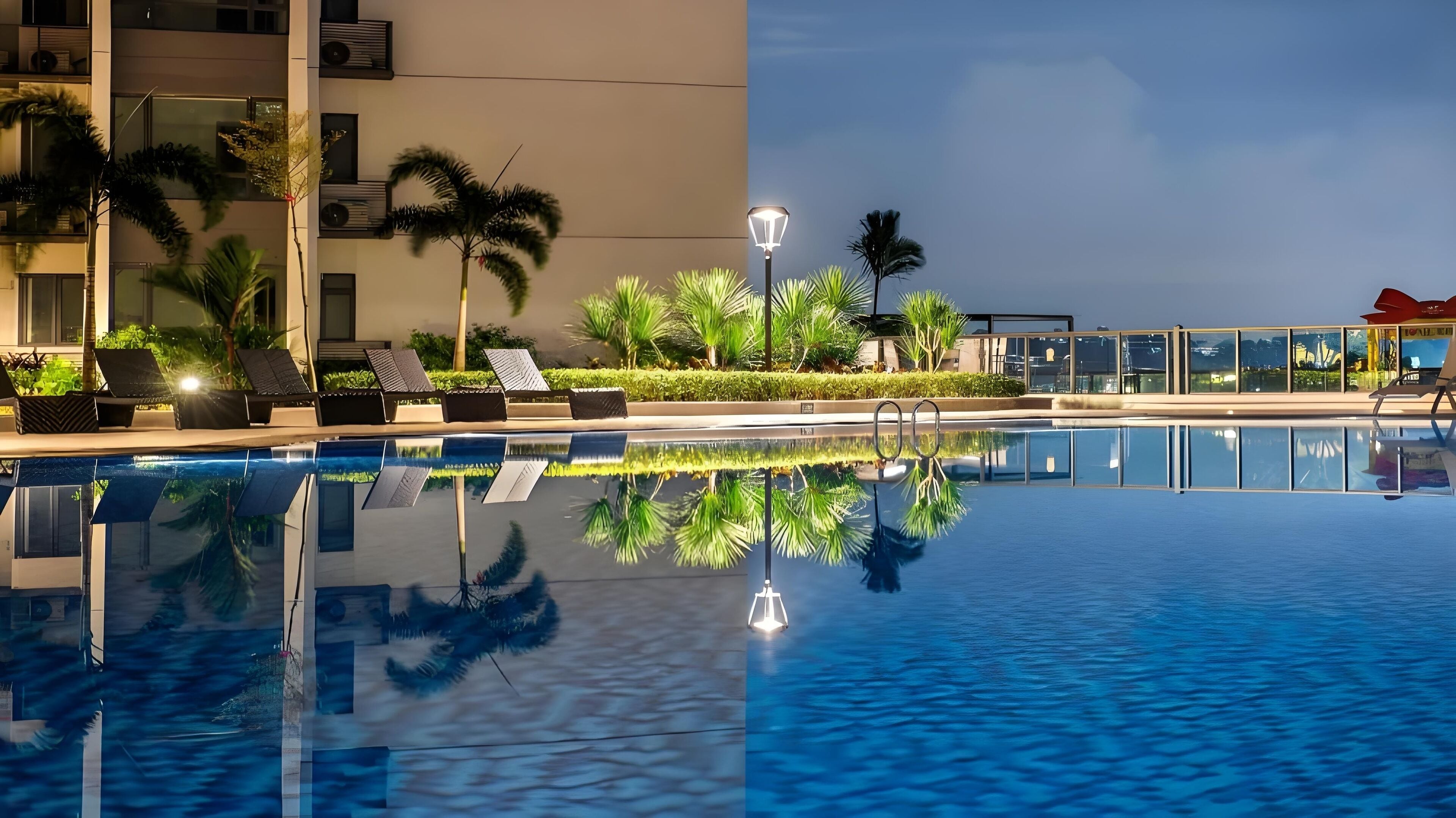 Outdoor pool, open 9:00 AM to 6:00 PM, pool loungers