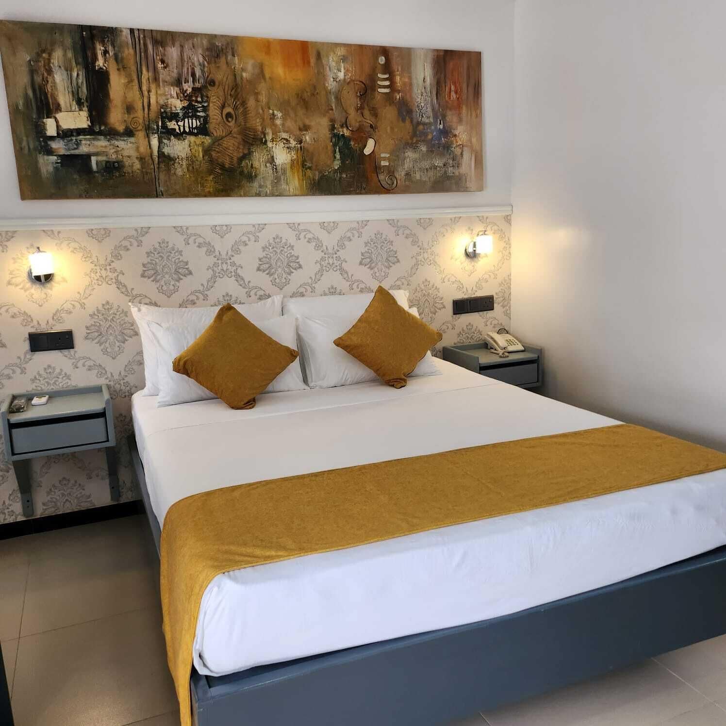 Premium bedding, down comforters, pillowtop beds, in-room safe