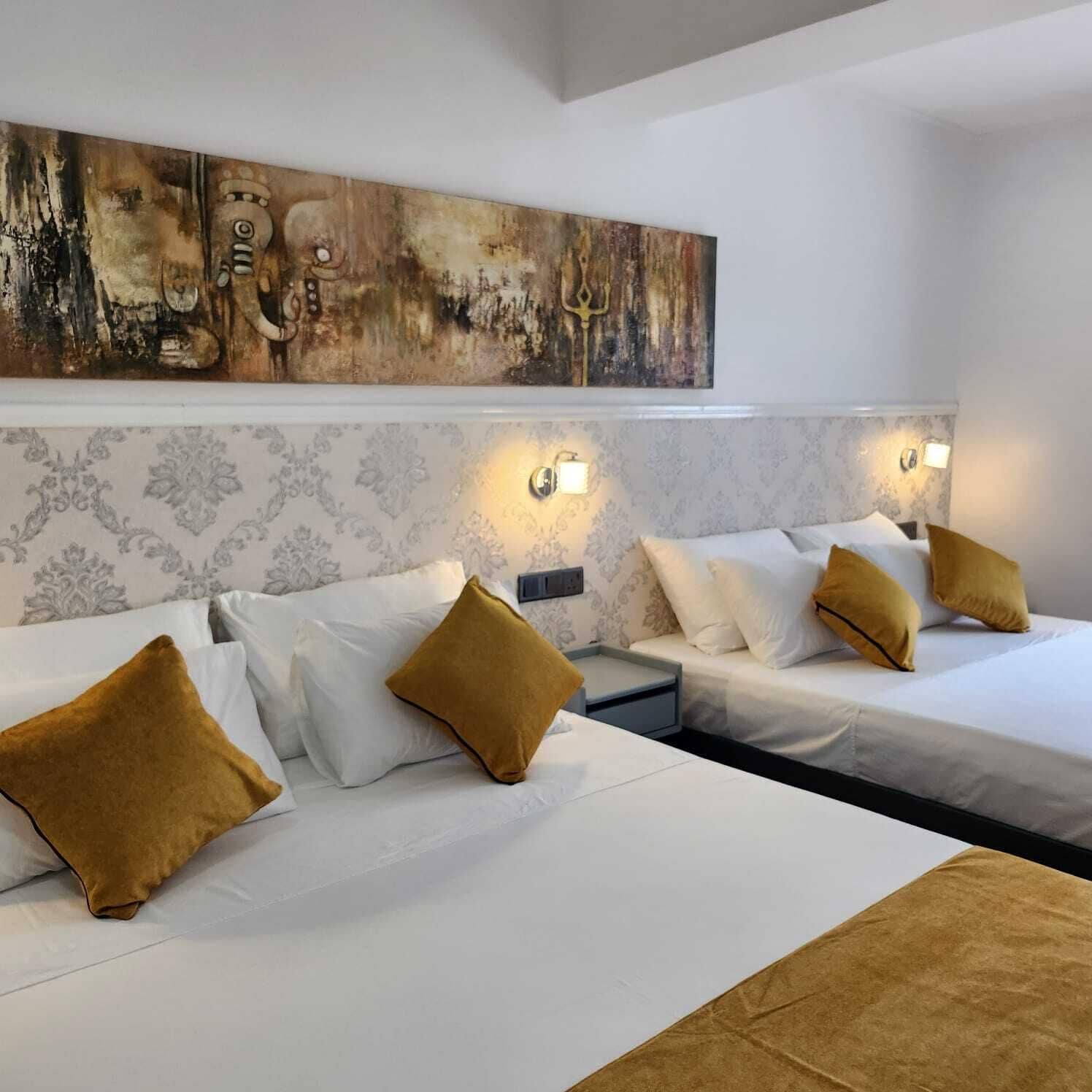 Deluxe Quadruple Room, City View | Premium bedding, down duvets, pillow-top beds, in-room safe