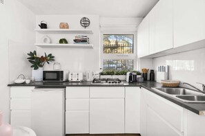 Microwave, stovetop, coffee/tea maker, toaster