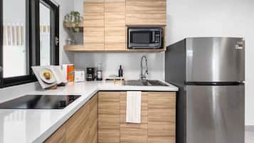 Fridge, microwave, stovetop, coffee/tea maker