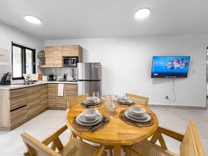 Fridge, microwave, stovetop, coffee/tea maker