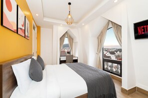 Minibar, fer et planche à repasser, draps fournis