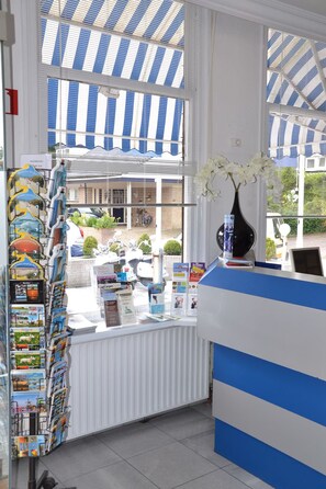 Welcome to our reception area, where you can browse local postcards and brochures, and enjoy the view of the surrounding area.