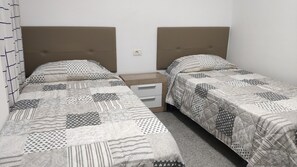 2 habitaciones, tabla de planchar con plancha y acceso a internet