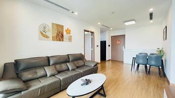 Apartamento, 3 quartos, sacada | 2 quartos, cortinas blackout, ferros/tábuas de passar roupa