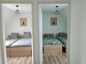 4 bedrooms, iron/ironing board, travel cot