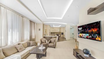 Exclusive Apartment, 3 Bedrooms, Non Smoking, Balcony | Living area | TV