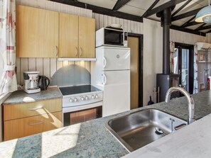 Fridge, microwave, dishwasher, cookware/dishes/utensils