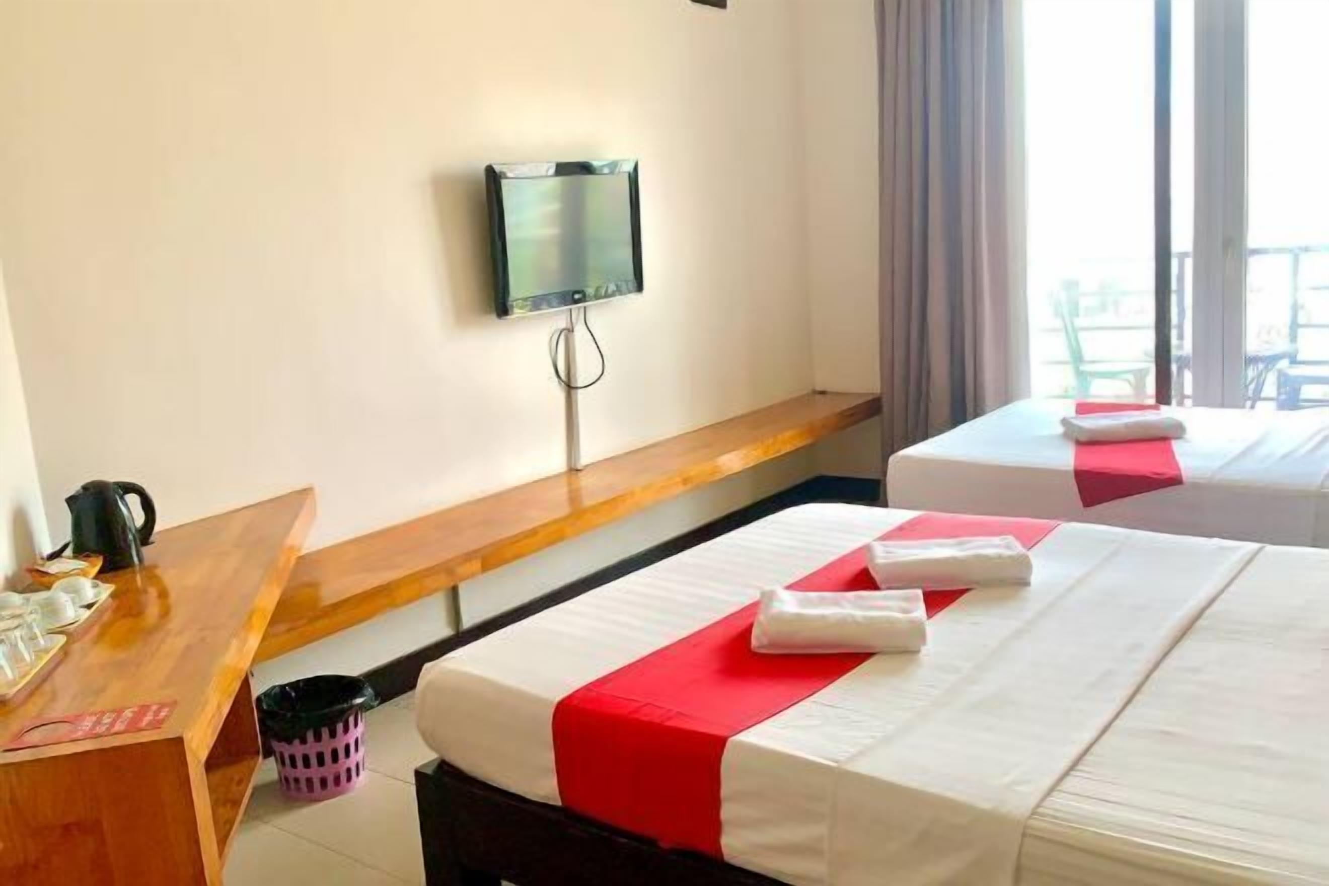 客房内保险箱、办公桌、免费 WiFi、床单