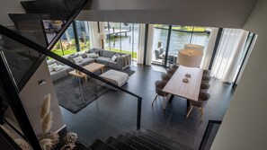 Villa (Watervilla 6) | Living area | TV - Dormio Harbour Village (Arnemuiden)