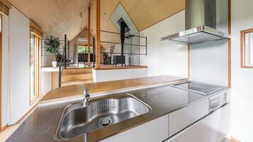 Full-size fridge, microwave, stovetop, electric kettle