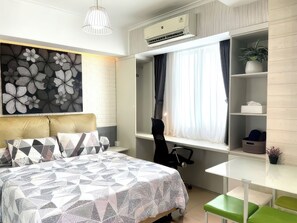 Deluxe Studio, Balcony, City View | Minibar, desk, laptop workspace, blackout drapes - Maple Park Apartment near JI Expo (Jakarta)