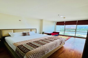 Minibar, desk, laptop workspace, blackout drapes - Staycation Jakarta - Ancol Mansion Apt (Jakarta)