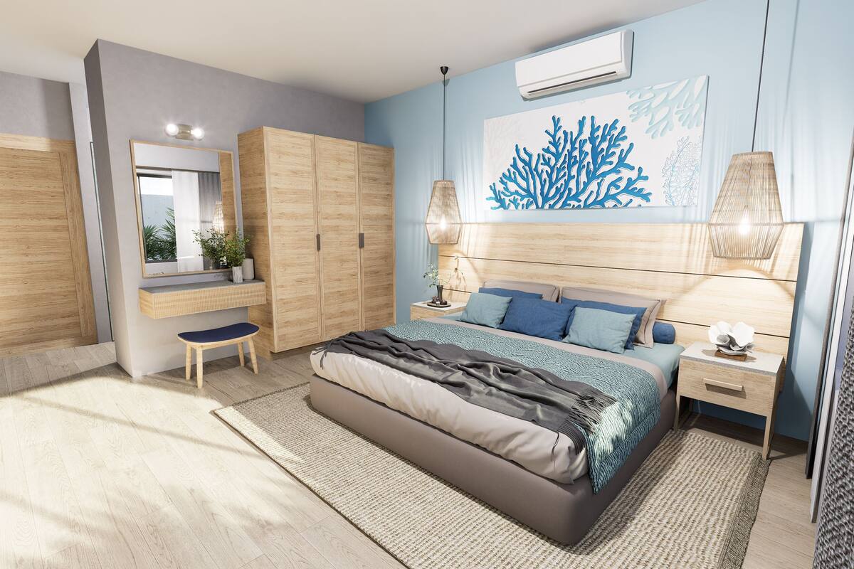 Ein modernes Schlafzimmer mit Bett, Nachttischen, einem Schminktisch und einem großen Spiegel.