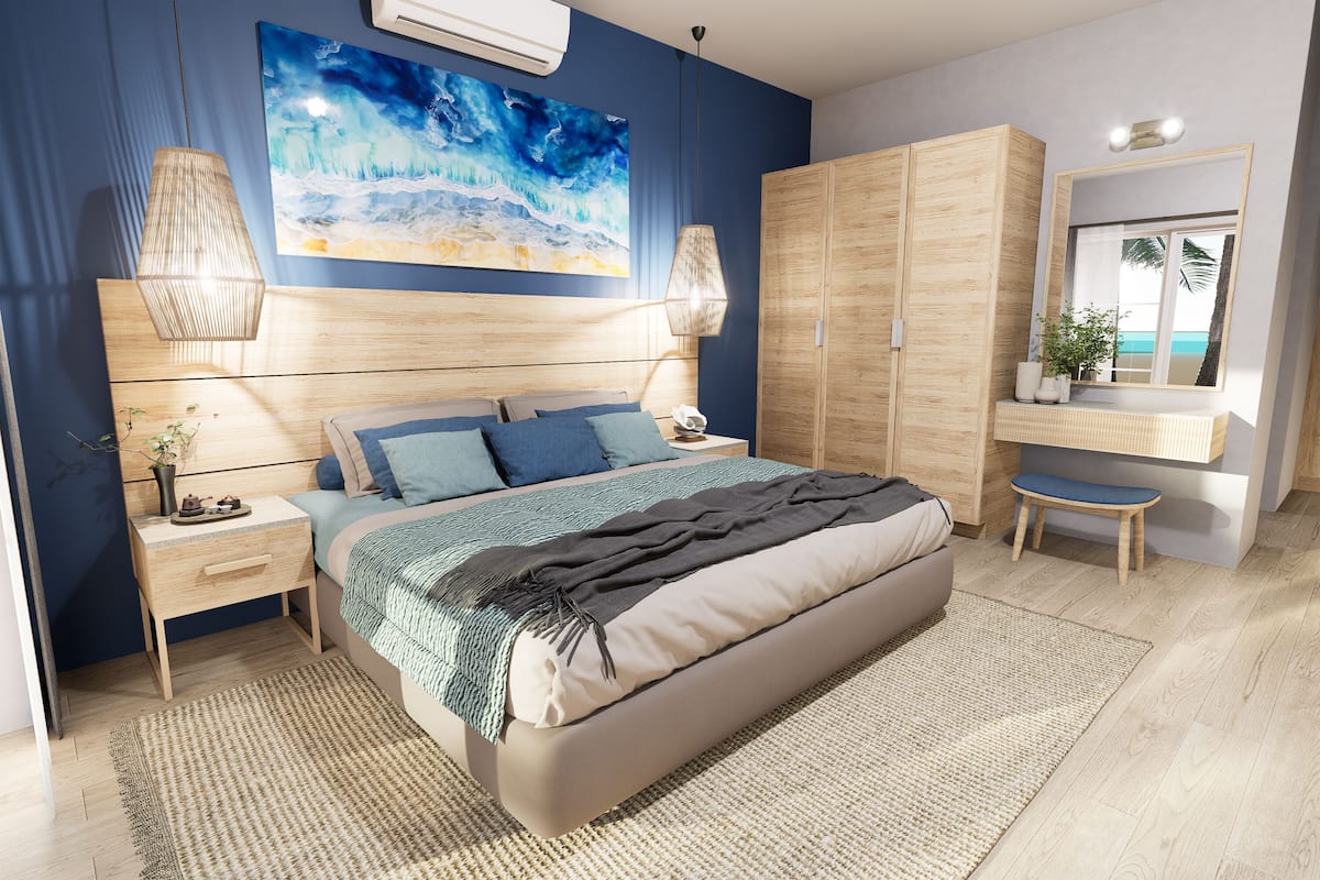 Ein modernes Schlafzimmer mit einem großen Bett, einem Holzschrank, Nachttischen und einem großen Gemälde an der Wand.