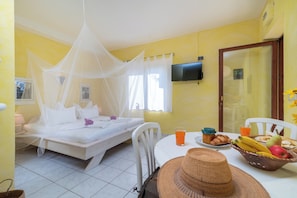 Iron/ironing board, travel crib, free WiFi, bed sheets