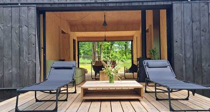 Charming chalet in Sainte-Foy-de-Longas nestled in a private woodland forest