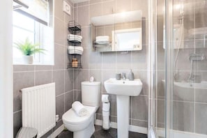 Shower, hair dryer, towels