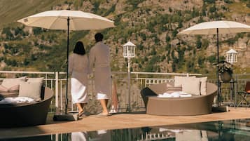 Indoor pool, outdoor pool, pool umbrellas, pool loungers