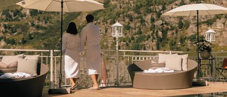 Indoor pool, outdoor pool, pool umbrellas, pool loungers