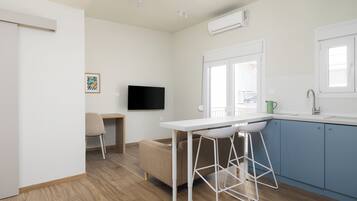 Apartment, 1 Bedroom | Desk, laptop workspace, iron/ironing board, free WiFi