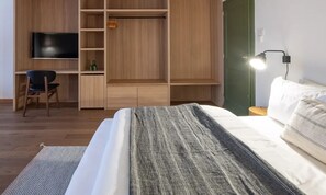 Suite Signature | Caja fuerte, wifi gratis, ropa de cama